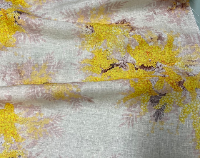 100% Linen designer print, Beautiful ivory base with yellow lilac floral design Linen printed fabric 58” wide. Sold by the yard