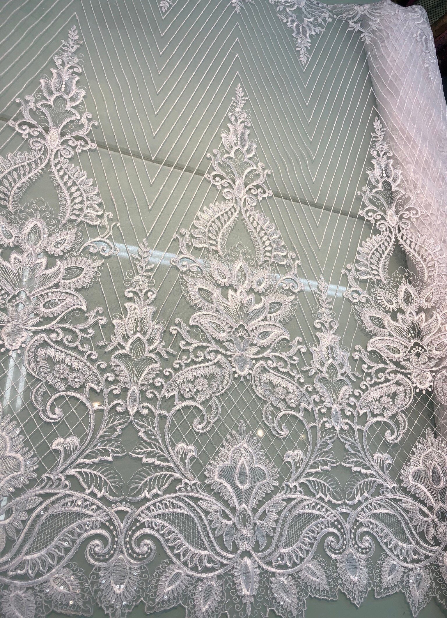 White bridal lace 52 wide Beautiful white re embroidered bridal border style lace fabric sold by