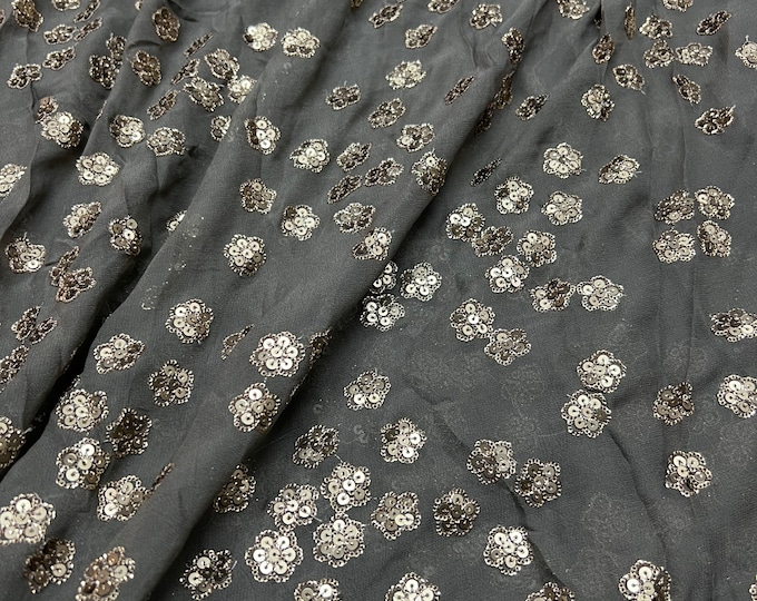 Beautiful dark gray base with Matte gold embroidered chiffon 46”wide    Beautiful floral sequenced embroidered viscose soft chiffon.