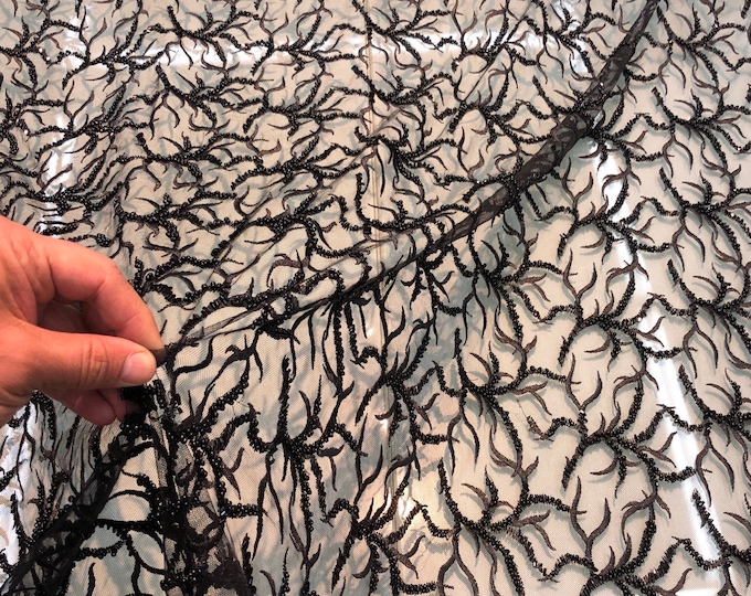 Hand beaded floral design black lace on meah fabric sold by the yard