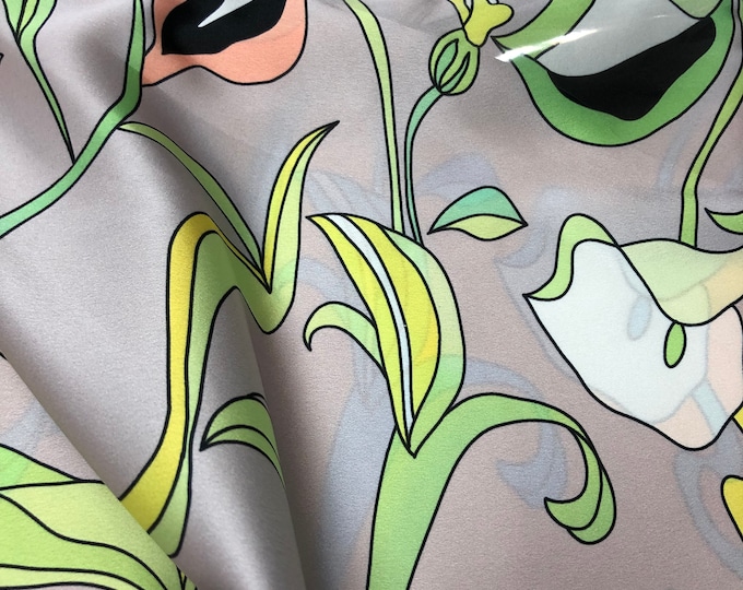 Beautiful Charcoal gray, green and black ivory peach floral digital print on silky satin 54” wide. Sold by the yard. Best used for apparel