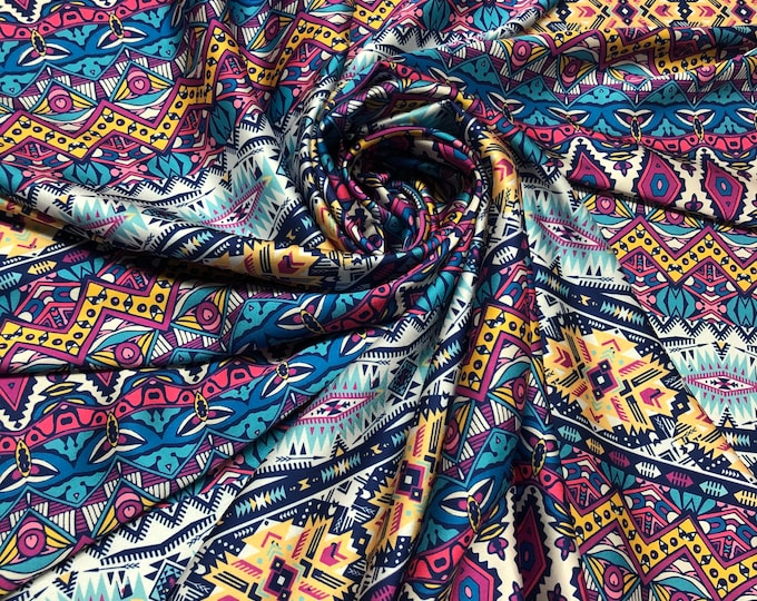 Beautiful multi color abstract stripe style designer pattern digital print on silky satin 54” wide. Sold by the yard. Best used for apparel