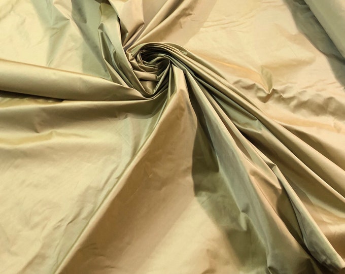 Gold silk taffeta 54" wide   Beautiful iridescent gold color silk taffeta fabric sold by the yard