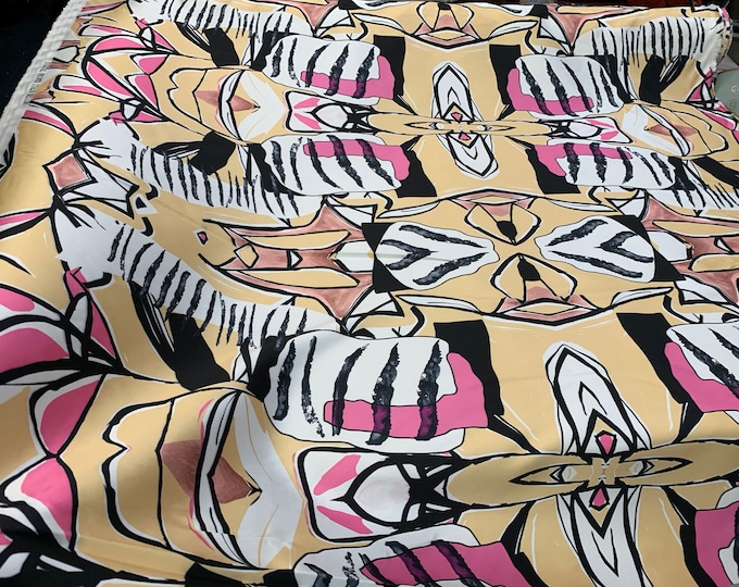 Mikado Zibelline printed fabric 54” wide. Beautiful African print canary yellow base with black pink print best used for apparel.