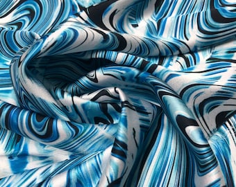 Beautiful aqua baby blue white swirl design digital print 54” wide.  Satin Charmouse digital print. Sold by the yard