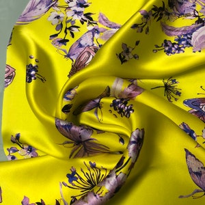 100% silk satin charmeuse digital print 54&quot; wide    Beautiful yellow base with purplish shade floral designs print  silky soft fabric