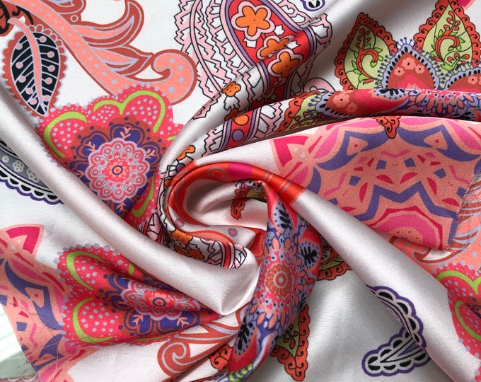 Beautiful paisley floral multi color pink shades design digital print on silky satin 54” wide. Sold by the yard. Best used for apparel