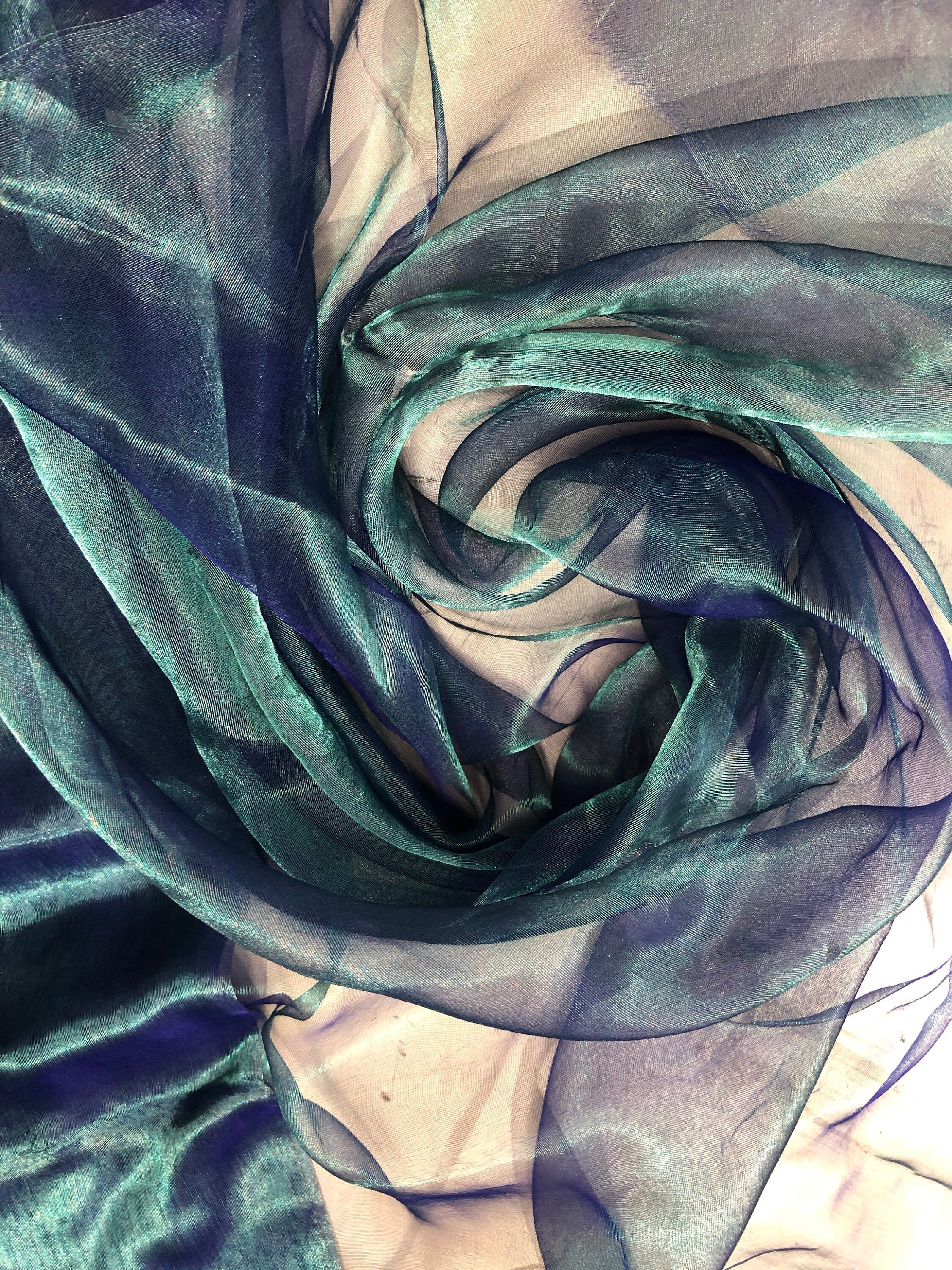 Metallic peacock color 100 silk organza 45 wide usable for apparel Metallic peacock color 100 silk organza 45 wide usable for apparel