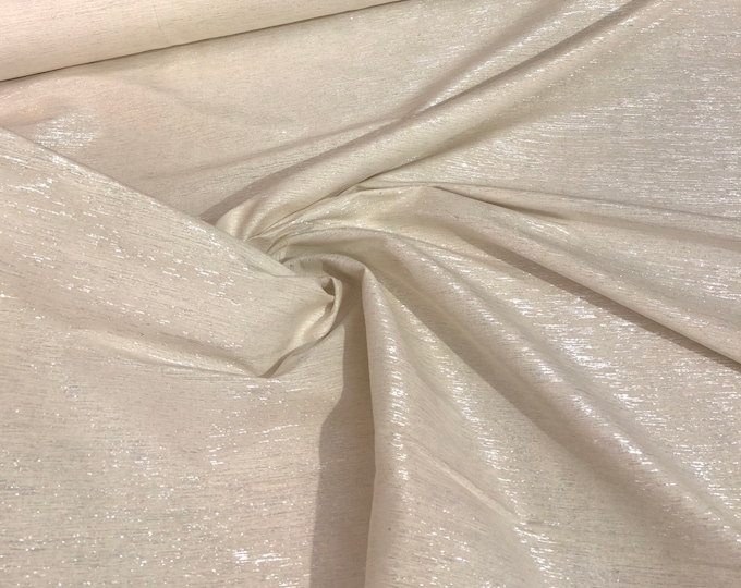 Raw silk 48" wide   Beautiful ivory color noil silk with matalic silver stripes in the fabric sold by the yard