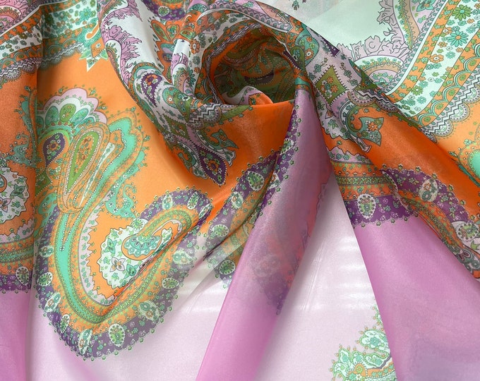 Satin face organza, also called Gazzar 54” wide. Beautiful pink green mustard colors Pasely design strip style multi color digital design