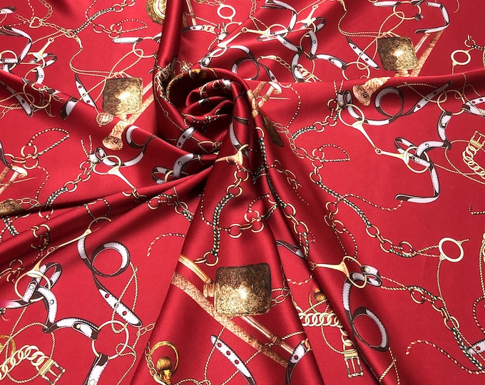 100% silk satin charmeuse digital print. Beautiful bright Burgandy wine base with jewelry digital design silky soft fabric 54” wide