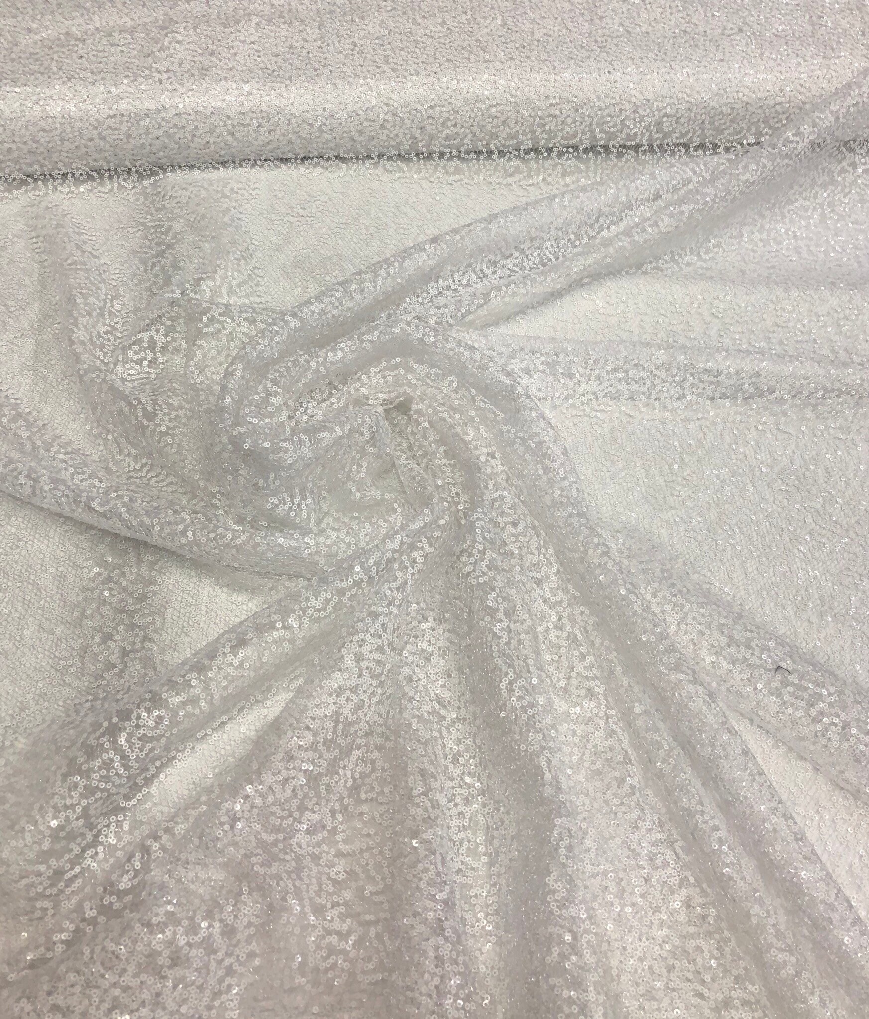 White sequins on sheer swirl mesh 52 wide Sequins fabric sold by the yard