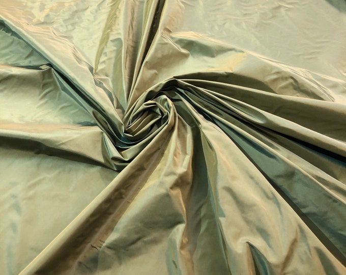 Silk taffeta 54" wide    Beautiful iridescent green gold silk taffeta fabric sold by the yard