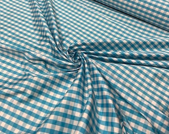 Beautiful taffeta turquoise & white gingham check 54” wide.  Best used for apparel and home Decore.  Sold by the yard