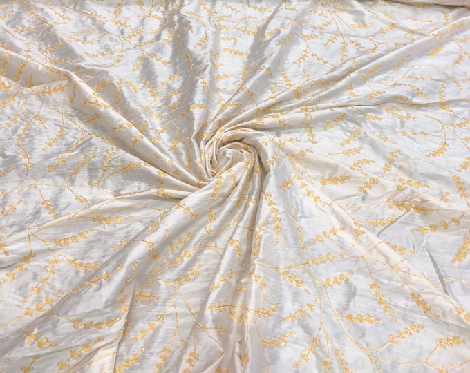 100% silk shantung hand embroidery 54" wide    Beautiful white shantung/ yellow gold hand embroidered silk shantung fabric sold by the yard