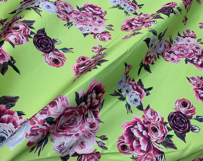 Mikado Zibelline printed fabric 54” wide.  Beautiful bright green base floral design beat used for apparel. Sold by the yard