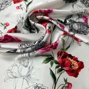 100% silk satin charmeuse digital print 54&quot; wide    Beautiful white background with Fusia red roses design soft fabric 54” wide