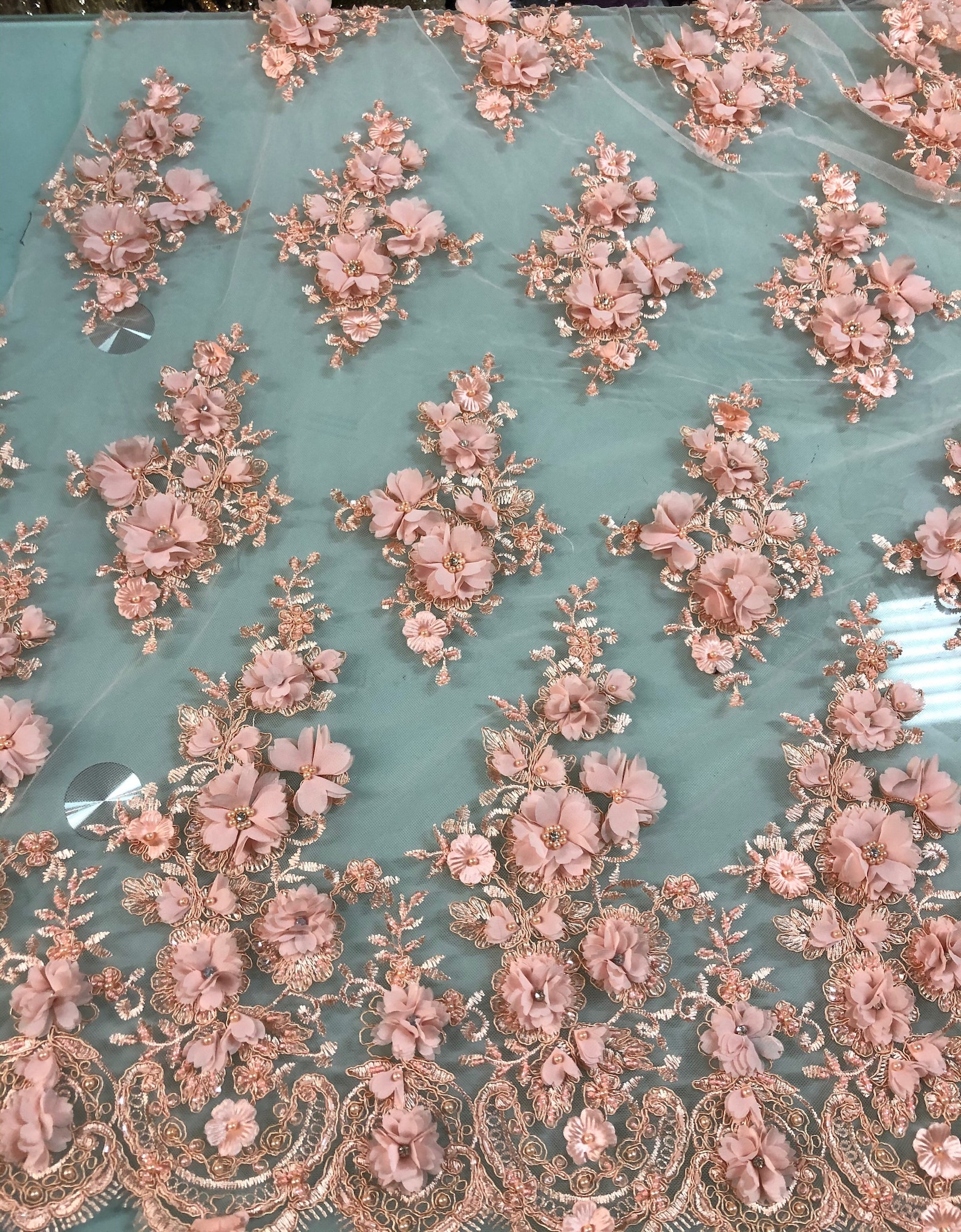 MAUVE/ROSE HAND BEADED FLORAL DESIGN EMBROIDERY ON A MESH LACE-SOLD BY YARD. main image 0