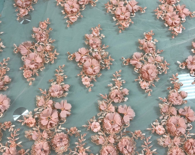 Hand beaded floral design with 3D flowers peach color lace on mesh fabric sold by the yard