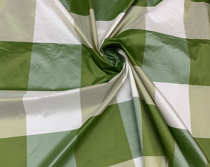 Beautiful parrot green and white 100% silk taffeta plaids 54” wide.  Best used for home decor and appreal.  Sold by the yard