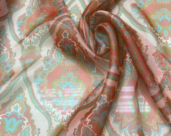 Satin face organza, also called Gazzar 54” wide. Beautiful copper turquoise Mix colors  Pasely floral digital design