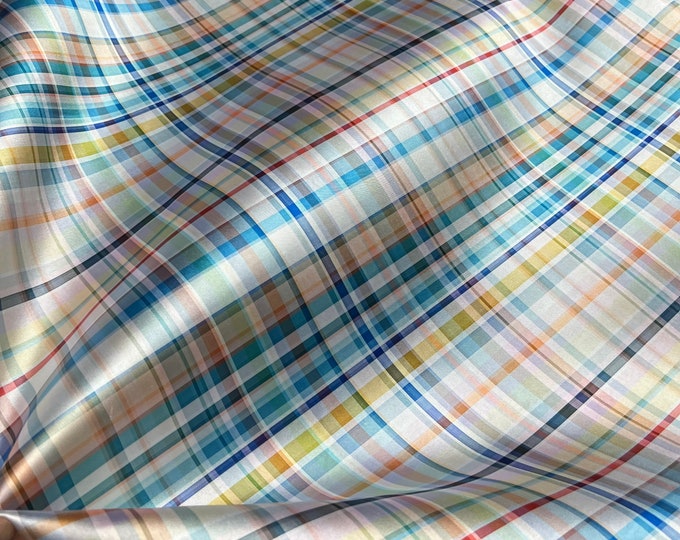 Mikado/ Zibelline  FabricMikado fabrics are a luxurious  that have a heavier weight. Beautiful off white base with blues yellows green plaid