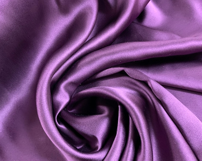 Beautiful egg plant color silk Charmouse 54” wide.  Best used for apparel.  Sold by the yard