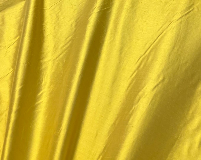 Silk shantung 54" wide   Beautiful bright cantaloupe yellow iridescent color silk shantung fabric sold by the yard