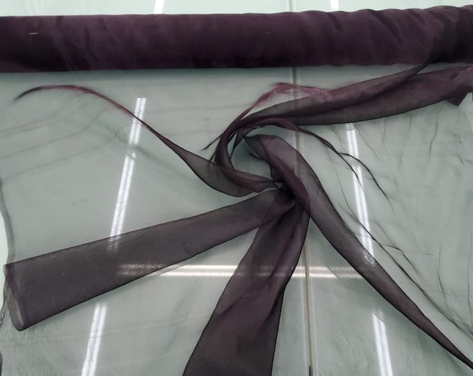 Beautiful Irredescent dark eggplant color silk matalic organza 45” wide.  Best used for appreal. Sold y the yard