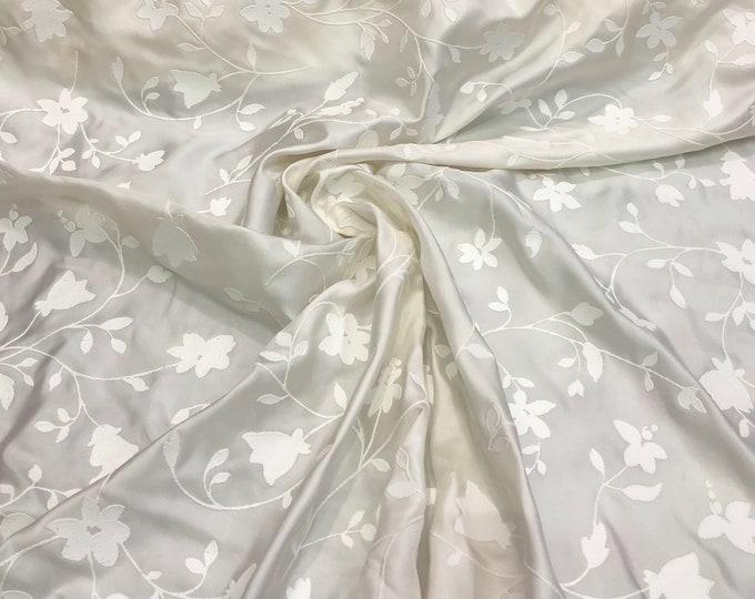 100% silk twill with embosed floral design, beautiful ivory color 60" wide silk fabric sold by the yard