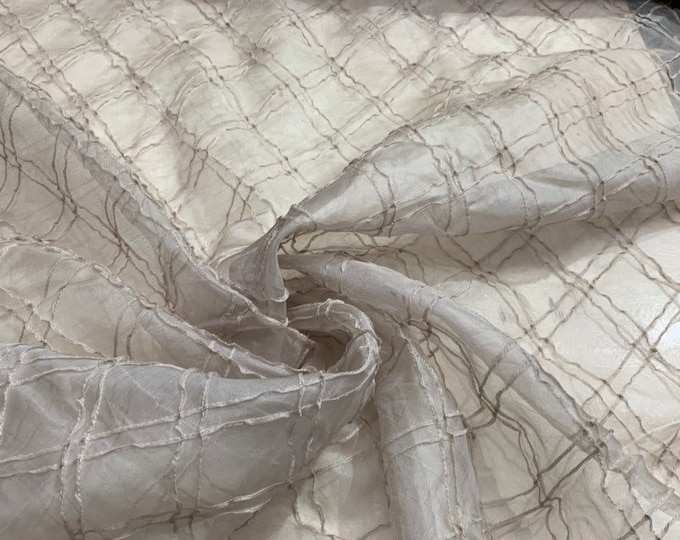 100% Silk organza pintuck 45" wide   Beautiful tan color pintuck organza sold by the yard best use for Appearel & home furnishing
