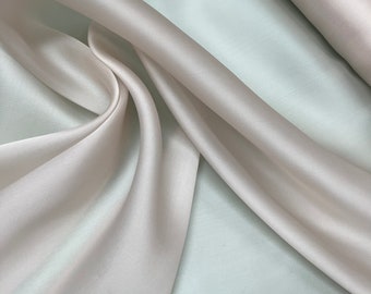 100% silk satin face organza, beautiful dusty rose pink  color Silk satin organza also called silk Gazzar. 54” wide. Sold by yard