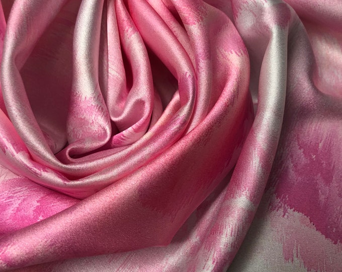 Digital satin Charmouse print 54” wide.  Beautiful abstract claud style ivory pink shades patten digitally printed fabric used for apparel.