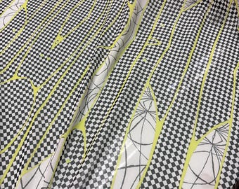 100% silk satin face georgette digital print 54" wide Beautiful ivory base with black dots with green accent abstract design silk 54” wide