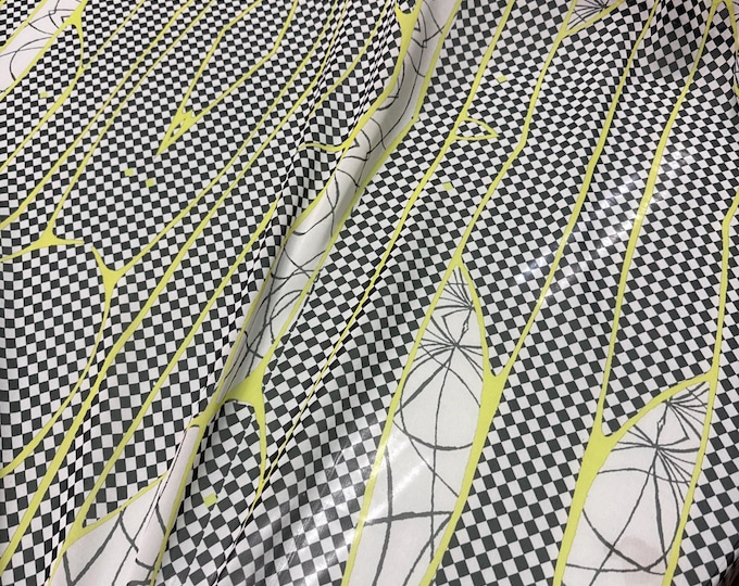 100% silk satin face georgette digital print 54" wide Beautiful ivory base with black dots with green accent abstract design silk 54” wide