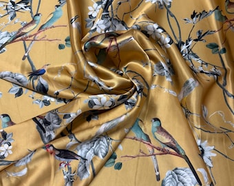 100% silk satin charmeuse digital print 54" wide    Beautiful gold base with silver gray branches and floral birds design silk 54” wide