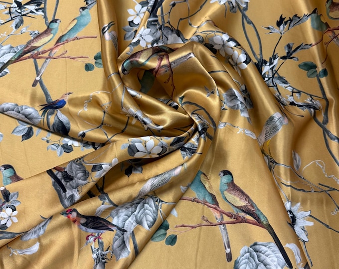 100% silk satin charmeuse digital print 54" wide    Beautiful gold base with silver gray branches and floral birds design silk 54” wide