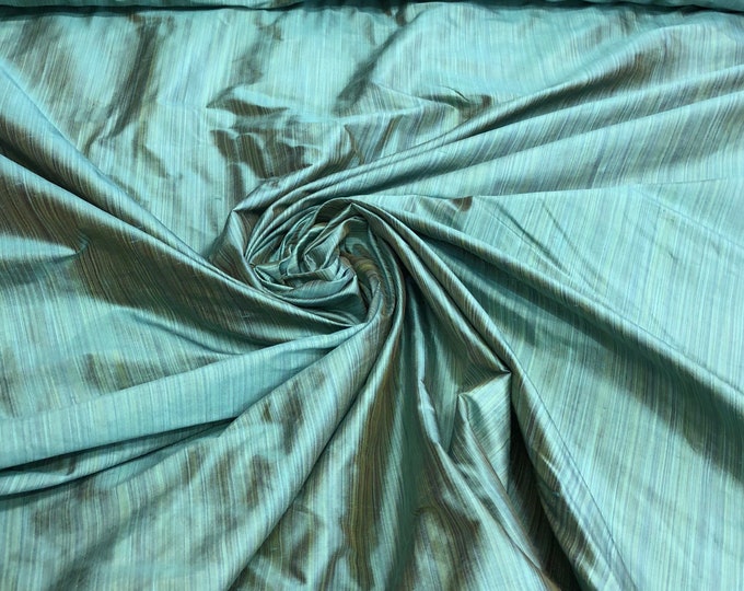 Silk shantung 54" wide   Beautiful pinstripe turquise color silk shantung fabric sold by the yard