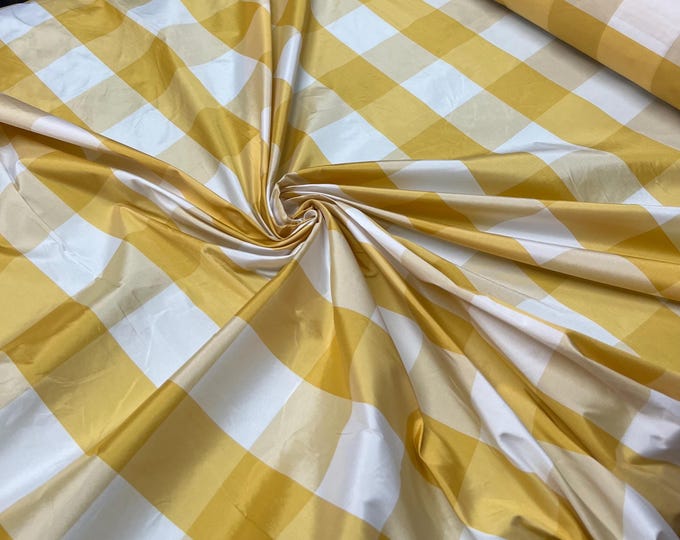 Beautiful Bright yellow and white taffeta plaids 54” wide.  Best used for home decor and appreal.  Sold by the yard