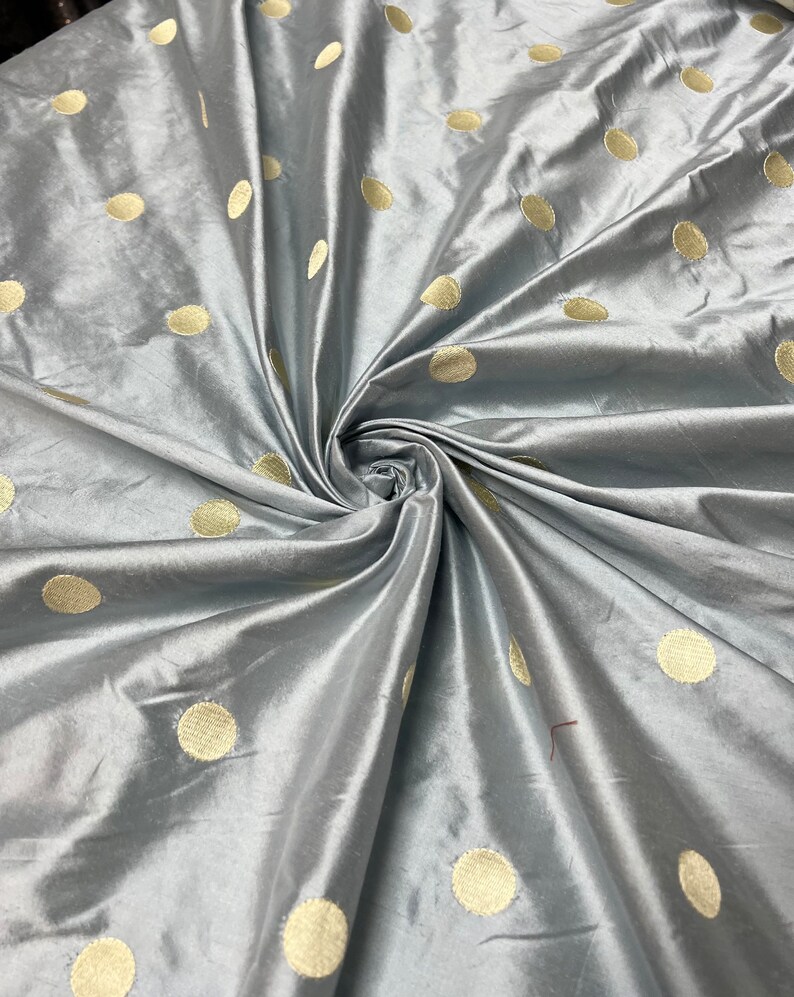 Beautiful 100% silk shantung embroidery 54” wide. Baby blue base color with champagne gold polka dot embroidery. Best used for home Decore image 5