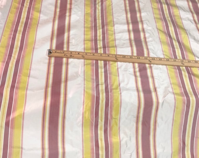 100% silk taffeta stripe 54" wide    Beautiful pink yellow white color      Fabric sold by the yard
