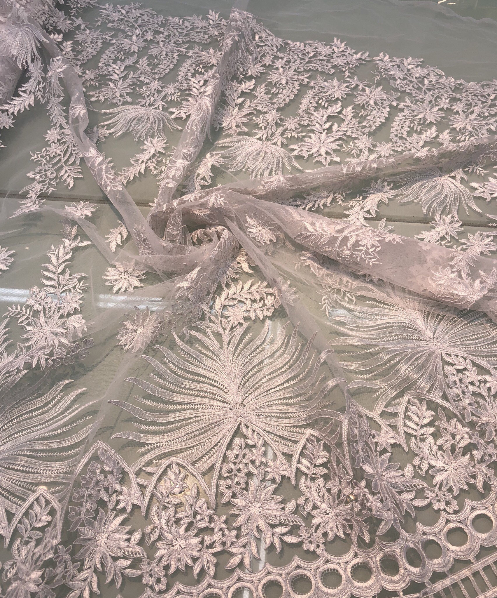 White bridal lace 52 wide. Beautiful white bridal lace border style white bridal lace fabric sold by the yard