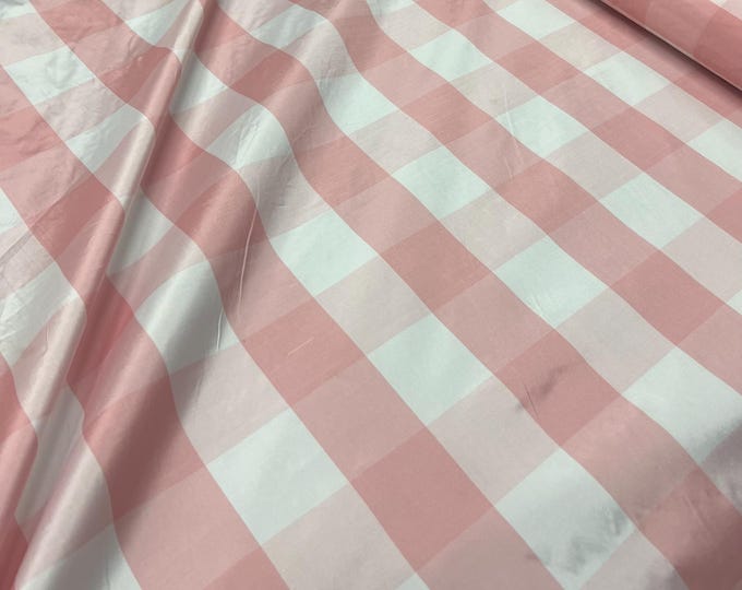 Beautiful Baby Pink and white taffeta plaids 54” wide.  Best used for home decor and appreal.  Sold by the yard