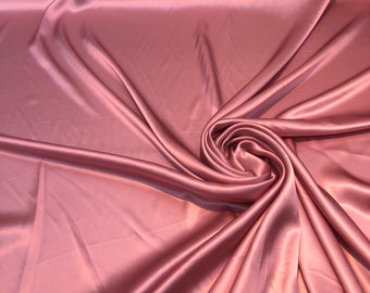 Silk charmeuse 54" wide    Beautiful mauve pink color silk satin charmouse fabric sold by the yard