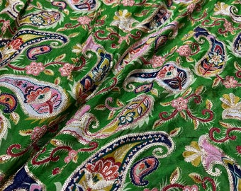 Bright green base with multi color print 46”wide    Beautiful artistic design Pasely style sequenced embroidered viscose soft chiffon.