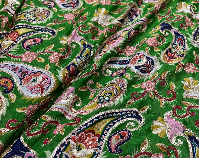 Bright green base with multi color print 46”wide    Beautiful artistic design Pasely style sequenced embroidered viscose soft chiffon.