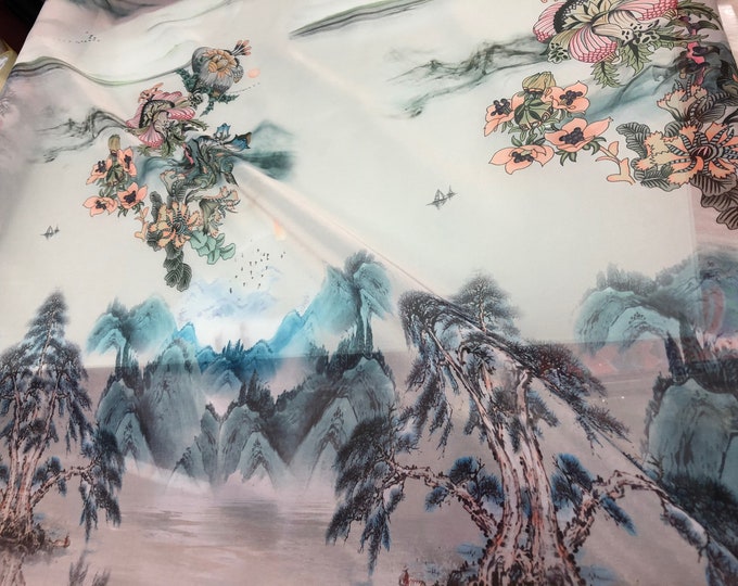 Satin face organza, also called Gazzar 54” wide. Beautiful ivory base mountain scenic view print in blue shades painting  style design