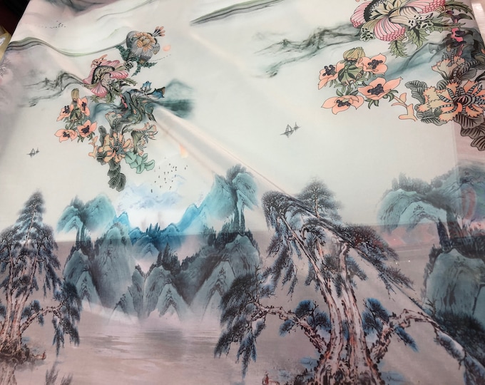 Satin face organza, also called Gazzar 54” wide. Beautiful ivory base mountain scenic view print in blue shades painting  style design