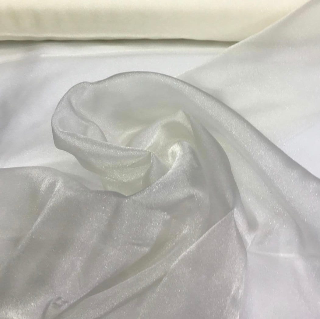 100% polyester ivory crystal organza 45 wide beautiful ivory color crystal  organza fabric sold by the yard