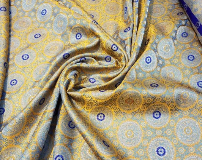 Jaquard floral brocade 44" wide   Beautiful yellow orange brocade fabric sold by the yard   Useable for apparel and interior decore